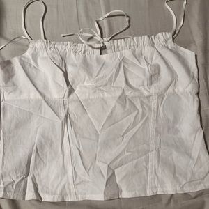 Cute top with tie and side zipper